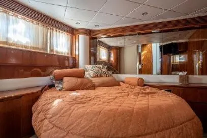 Slide: The Image of Luxurious bedroom interior of 2003 Viking Princess 65 yacht with elegant wood finishes. - 21