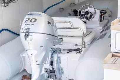Slide: The Image of 2003 Viking Princess 65 yacht interior with Honda 20 outboard motor. - 4