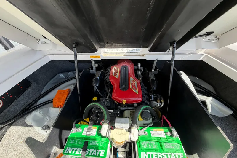 Slide: The Image of 2007 Nautique Crossover 236 engine compartment with Interstate batteries and ZR6 engine. - 17
