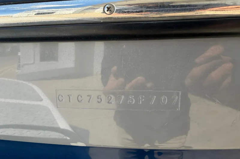 Slide: The Image of 2007 Nautique Crossover 236 boat hull identification number (HIN) close-up. - 22