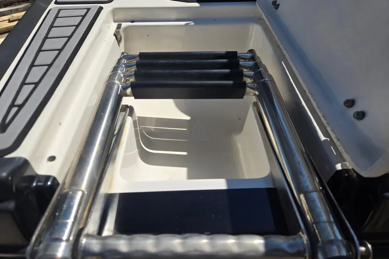Slide: The Image of Stainless steel ladder on a 2014 Monterey 214SS Super Sport boat. - 19