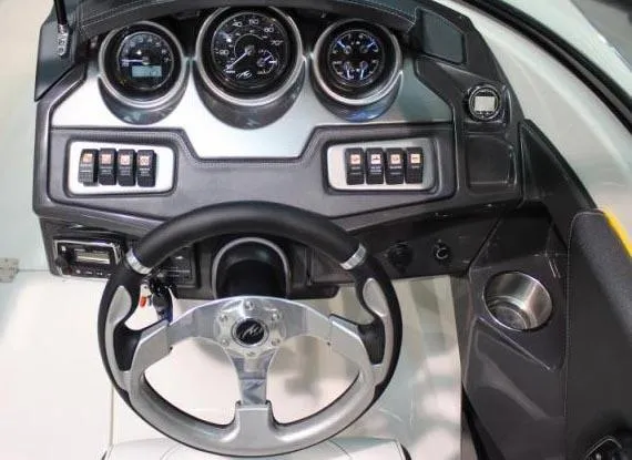 Slide: The Image of Manufacturer Provided Image: Dashboard of 2014 Monterey 214SS Super Sport boat with steering wheel and gauges. - 24