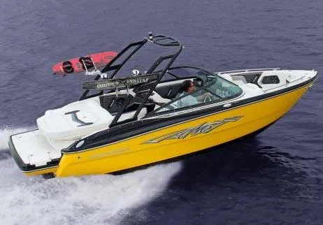 Slide: The Image of Manufacturer Provided Image: 2014 Monterey 214SS Super Sport boat cruising on water, vibrant yellow hull. - 25