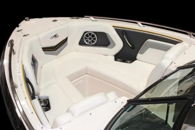 Slide: The Image of Manufacturer Provided Image: 2014 Monterey 214SS Super Sport boat interior with white seating and speaker system. - 26