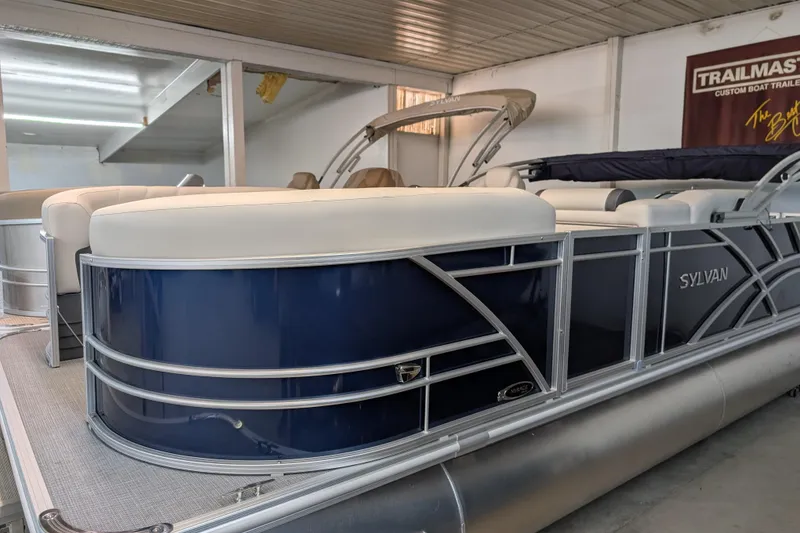 The Image of 2025 Sylvan Mirage Fish 8520 Party Fish pontoon boat in showroom. - 0