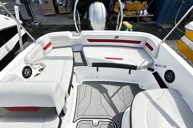 Slide: The Image of Interior of 2022 Godfrey Hurricane 185 SD boat with white and red seating. - 10