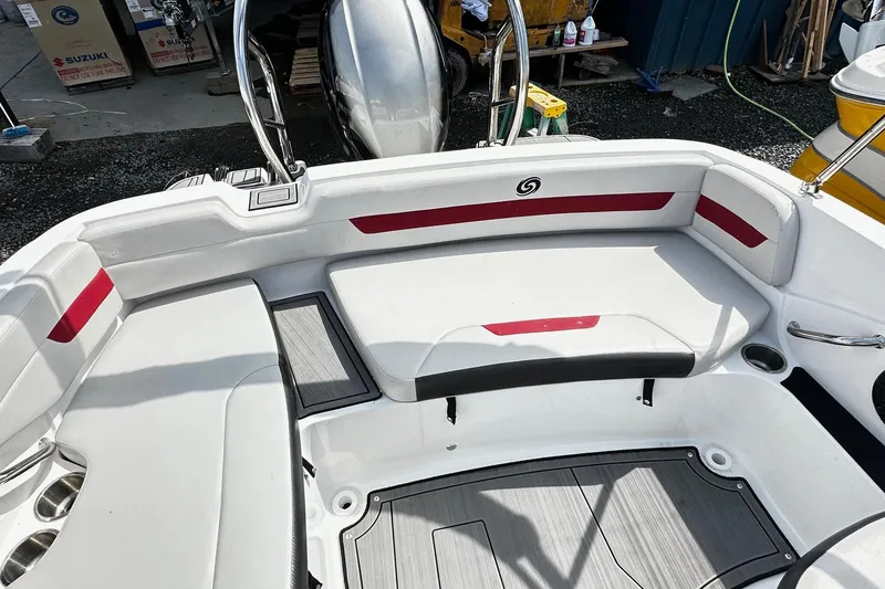 Slide: The Image of Interior of 2022 Godfrey Hurricane 185 SD boat with white and red seating. - 9