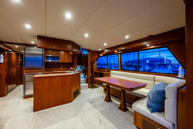 Slide: The Image of Luxurious interior of 2009 Northwest Powercats 58 yacht with modern kitchen and seating area. - 19