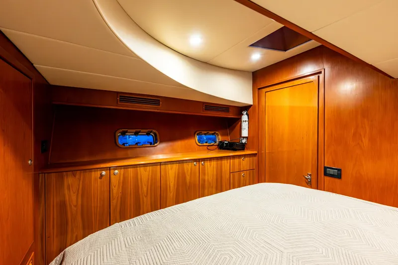 Slide: The Image of Luxurious cabin interior of 2009 Northwest Powercats 58 yacht with wooden finishes. - 35