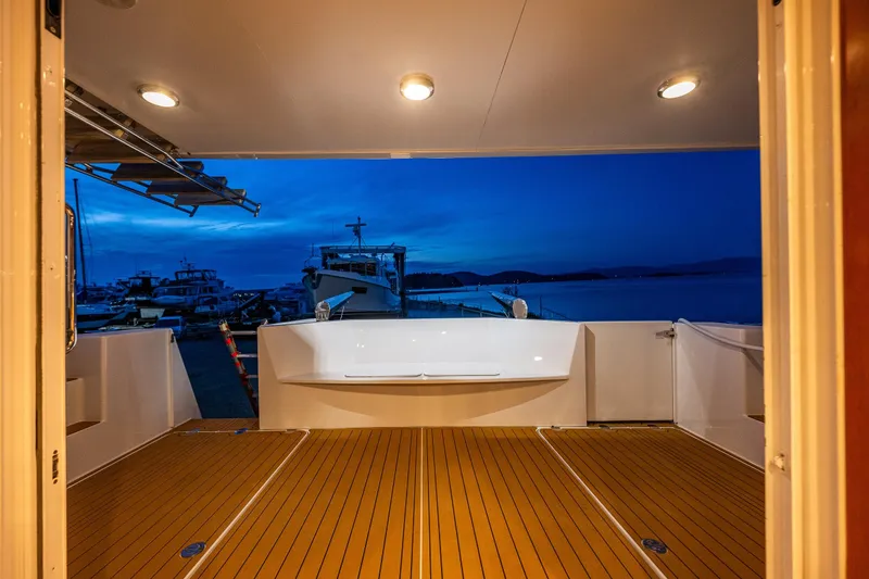 Slide: The Image of Luxurious 2009 Northwest Powercats 58 yacht interior with evening marina view. - 42