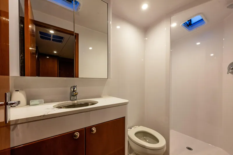Slide: The Image of Luxurious bathroom in 2009 Northwest Powercats 58 yacht with modern fixtures and elegant design. - 8