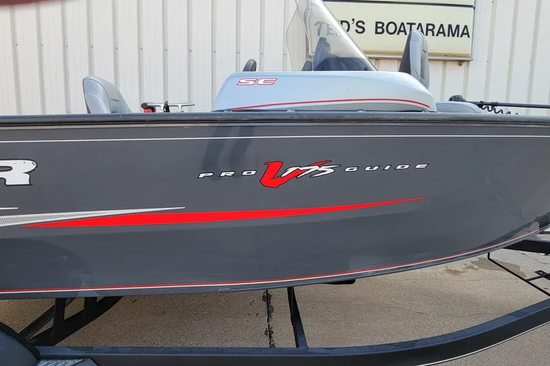 Slide: The Image of 2019 Tracker Pro Guide V-175 SC serial number plate with barcodes and engraved details. - 18