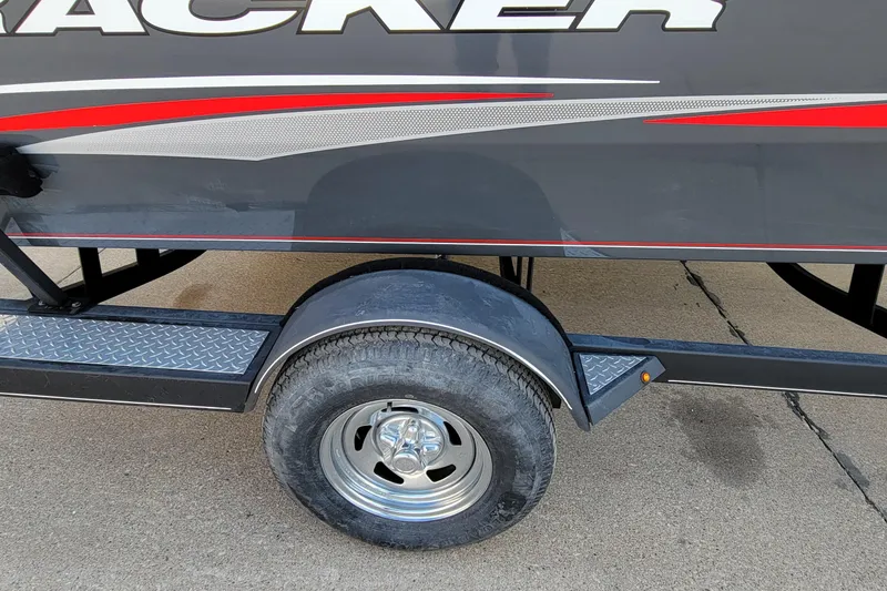 Slide: The Image of 2019 Tracker Pro Guide V-175 SC boat motor and propeller on concrete surface. - 19