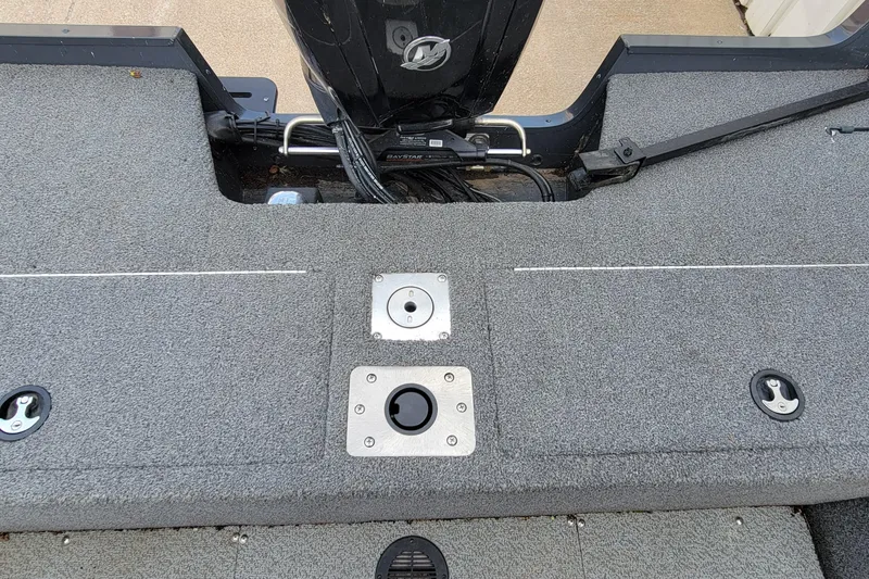 Slide: The Image of 2019 Tracker Pro Guide V-175 SC boat interior with storage compartment and seating. - 26