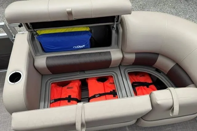 Slide: The Image of 2024 Sun Tracker Party Barge 22 RF XP3 seating with storage for life jackets and gear. - 11
