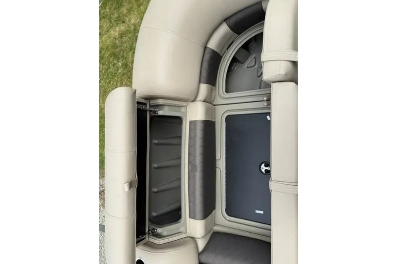 Slide: The Image of 2024 Sun Tracker Party Barge 22 RF XP3 interior seating and storage compartment. - 13