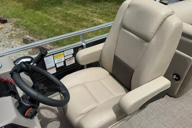 Slide: The Image of 2024 Sun Tracker Party Barge 22 RF XP3 captain's chair and steering wheel. - 15