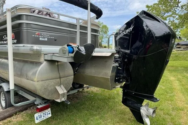 Slide: The Image of 2024 Sun Tracker Party Barge 22 RF XP3 with Mercury outboard engine on trailer. - 7