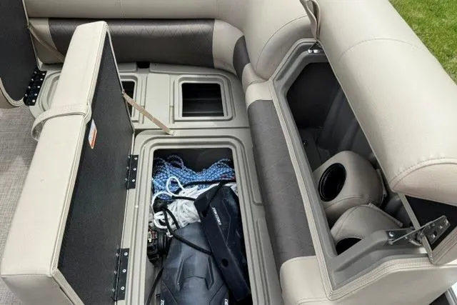 Slide: The Image of 2024 Sun Tracker Party Barge 22 RF XP3 storage compartments with ropes and gear. - 8