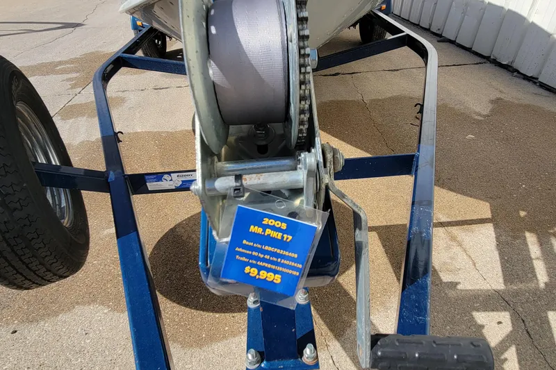 Slide: The Image of 2005 Lund Mr. Pike 16 boat trailer with winch, displayed for sale at $9,995. - 12