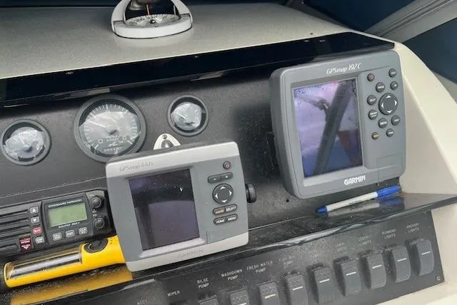 Slide: The Image of Dashboard of a 1996 Sea Ray Laguna 24 Flushdeck Cuddy with Garmin navigation equipment. - 5