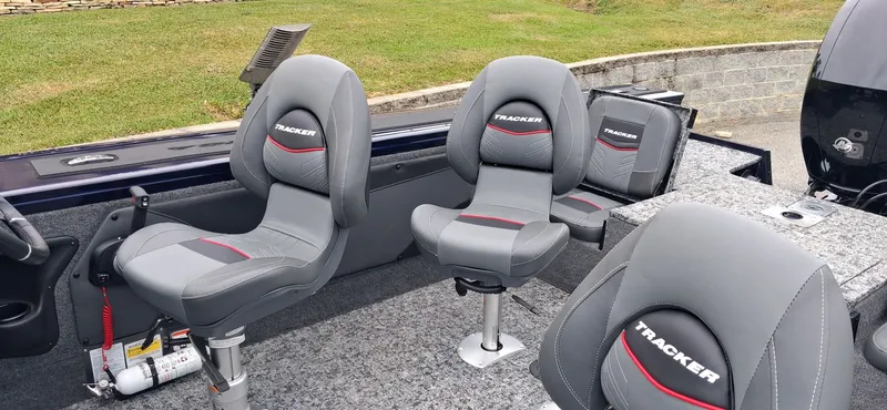 Slide: The Image of Interior of 2025 Tracker Targa V-19 Combo with gray seats. - 14