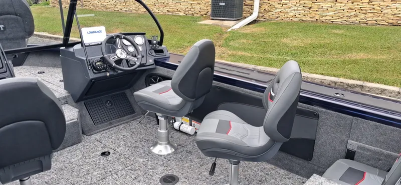 Slide: The Image of Interior of 2025 Tracker Targa V-19 Combo with gray seats. - 2
