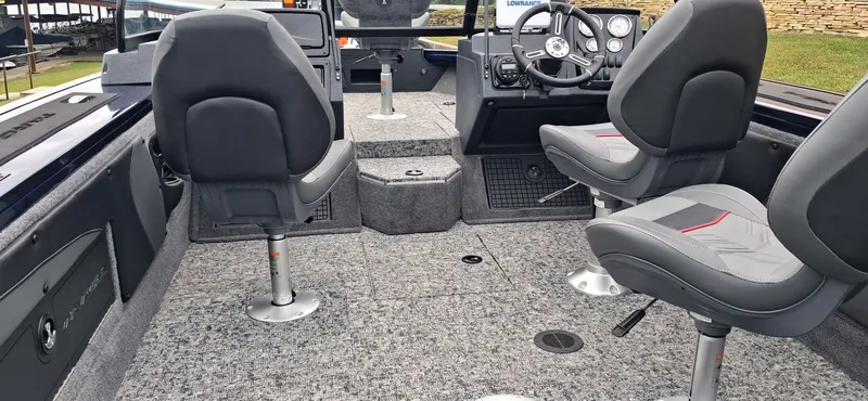Slide: The Image of Interior of 2025 Tracker Targa V-19 Combo with gray seats. - 4