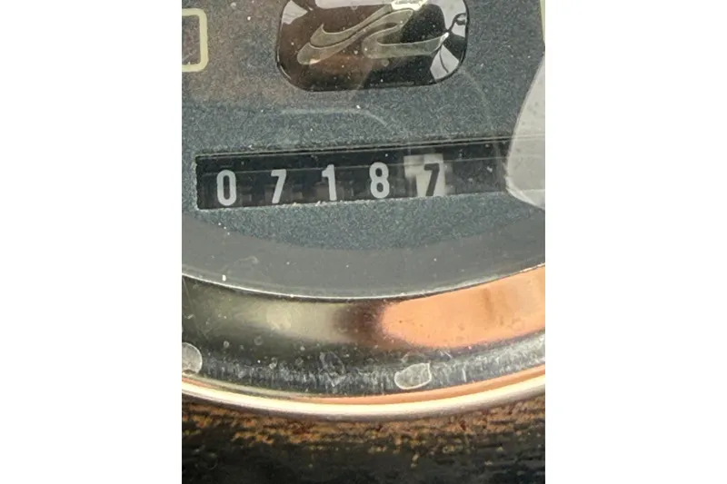 Slide: The Image of Odometer reading 7187 on 1997 Sea Ray 240 Sundancer boat dashboard. - 13