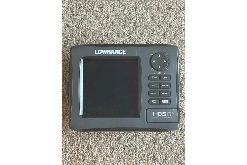 Slide: The Image of Lowrance HDS-5 marine GPS unit on carpet, compatible with 1997 Sea Ray 240 Sundancer. - 14