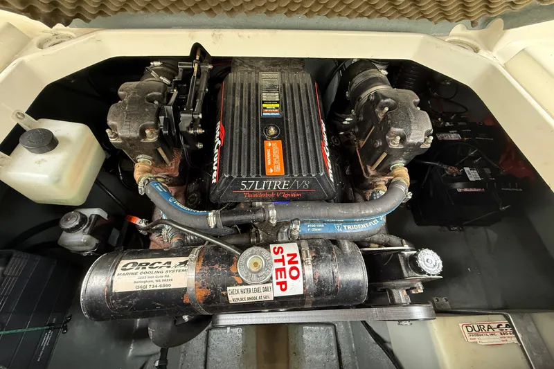 Slide: The Image of Engine compartment of a 1997 Sea Ray 240 Sundancer with 5.7L V8 engine. - 15