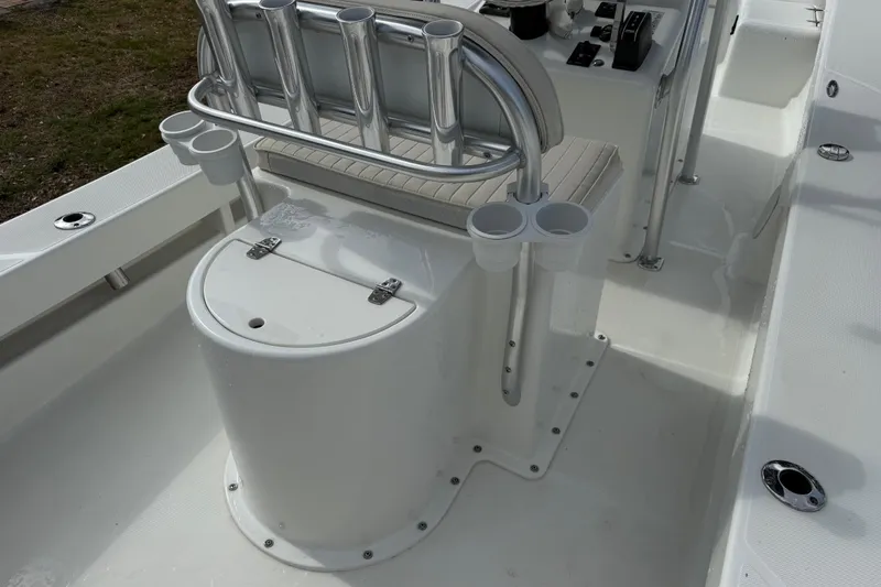 Slide: The Image of 2016 Panga 22 BOCA GRANDE boat interior with rod holders and seating. - 11