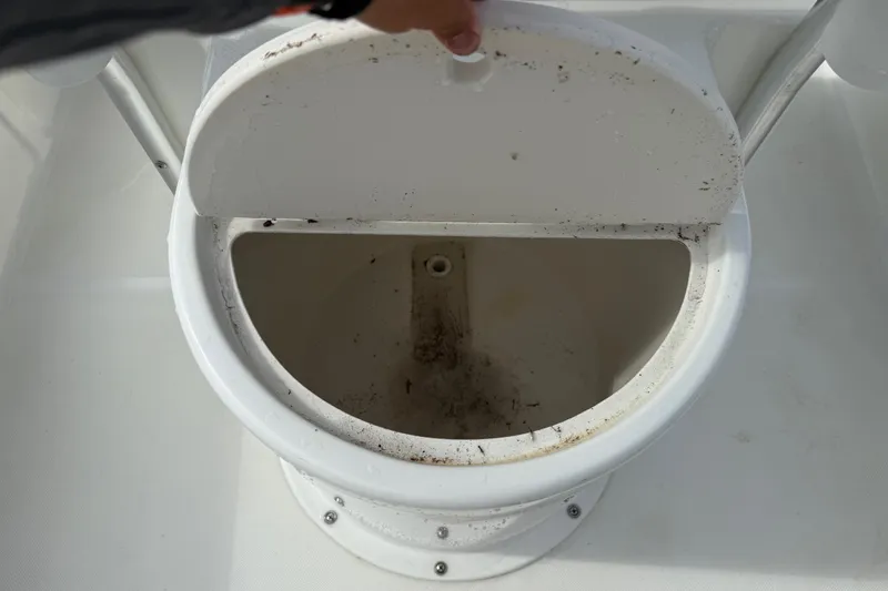 Slide: The Image of Open storage compartment on 2016 Panga 22 BOCA GRANDE boat, showing interior details. - 12