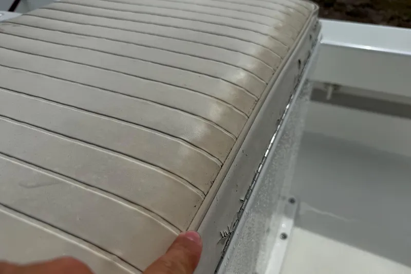Slide: The Image of Close-up of a worn seat cushion on a 2016 Panga 22 BOCA GRANDE boat. - 17