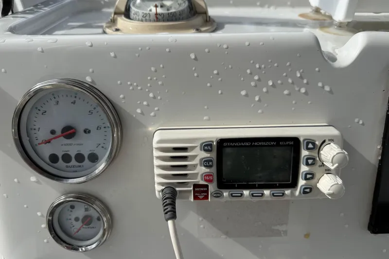 Slide: The Image of Close-up of 2016 Panga 22 BOCA GRANDE boat dashboard with gauges and radio. - 20