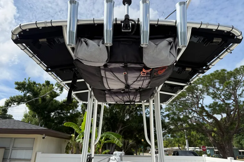 Slide: The Image of 2016 Panga 22 BOCA GRANDE boat with rod holders and storage, viewed from below. - 26