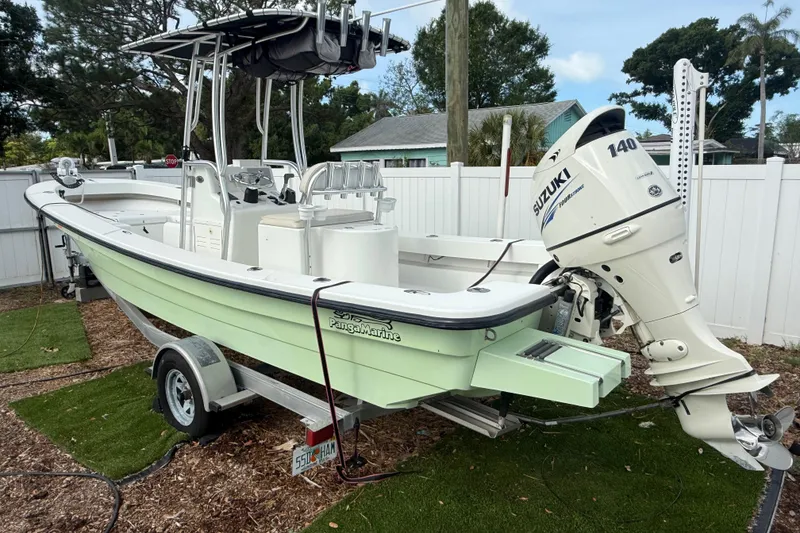 Slide: The Image of 2016 Panga 22 Boca Grande boat with Suzuki 140 outboard motor on trailer. - 3