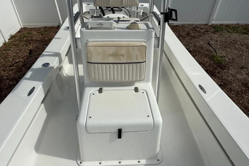 Slide: The Image of 2016 Panga 22 Boca Grande boat interior with seating and storage compartments. - 30