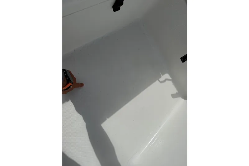 Slide: The Image of Interior view of a 2016 Panga 22 BOCA GRANDE boat, showing a clean white surface. - 35