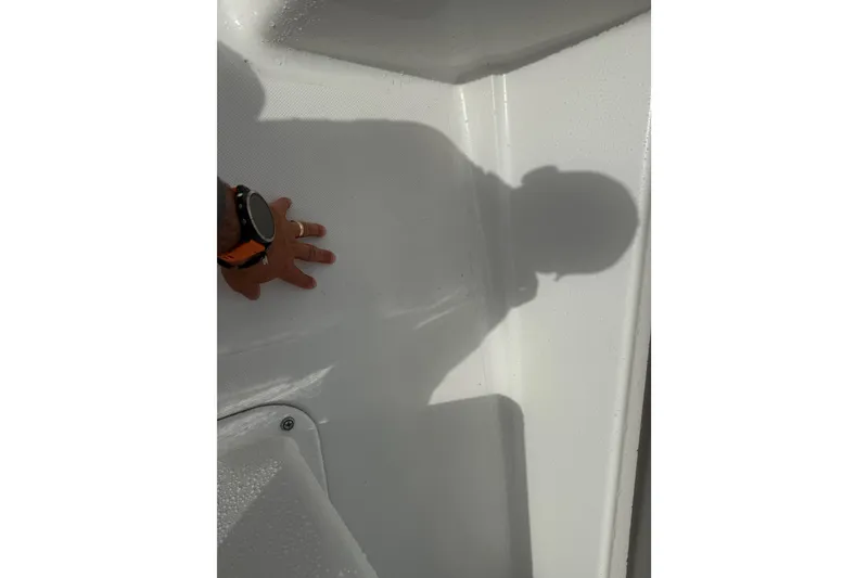 Slide: The Image of Hand and shadow on 2016 Panga 22 BOCA GRANDE boat interior surface. - 36