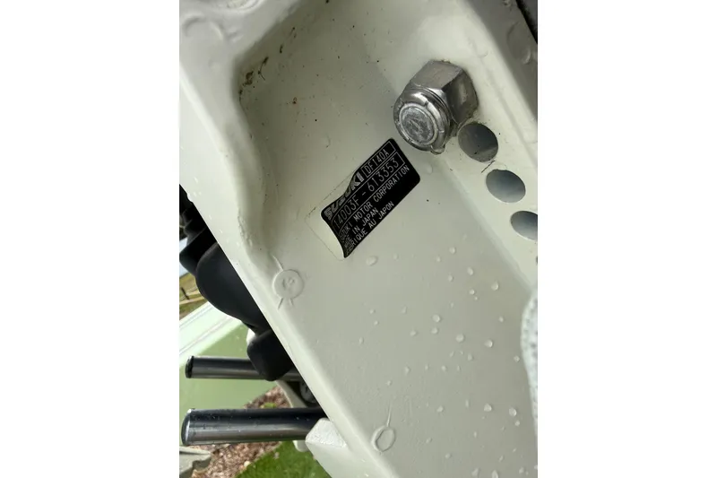 Slide: The Image of Close-up of a 2016 Panga 22 BOCA GRANDE boat component with a visible label and bolt. - 49
