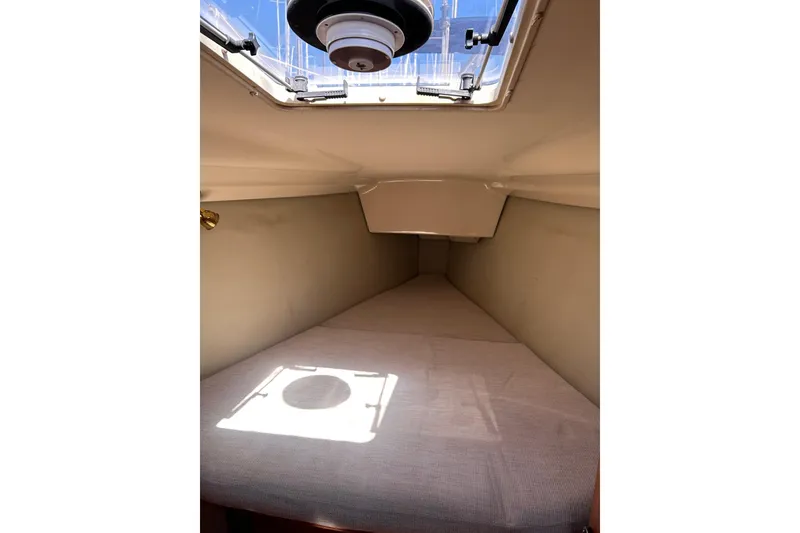 Slide: The Image of Interior cabin of 1991 Hunter Legend 375 sailboat with skylight and bed. - 13