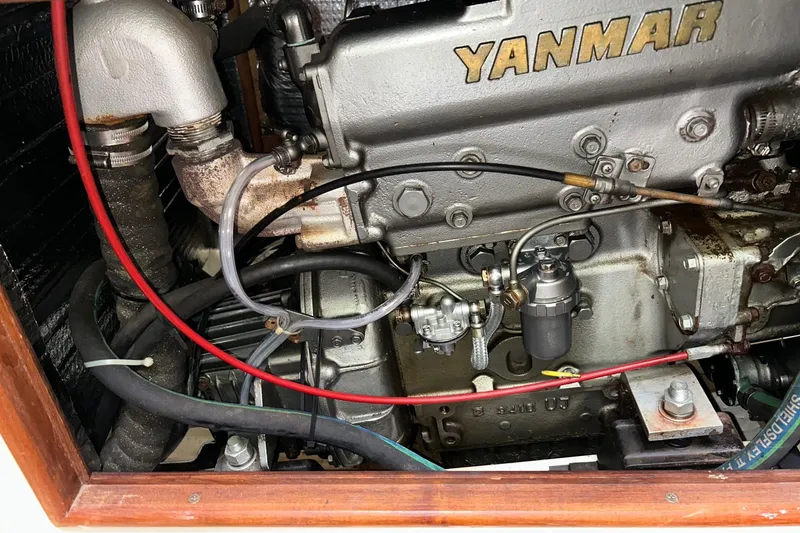 Slide: The Image of Engine compartment of a 1991 Hunter Legend 375 sailboat with Yanmar engine. - 15