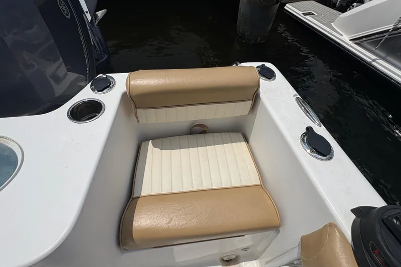 Slide: The Image of 2013 Seahunt Triton 225 boat dashboard with Garmin GPS and Yamaha gauges. - 19