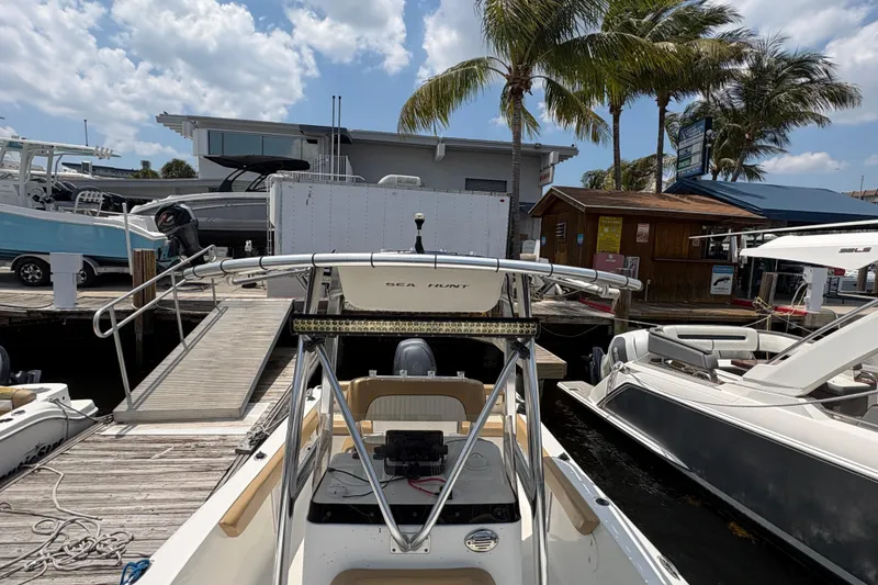 Slide: The Image of Livewell on a 2013 Seahunt Triton 225 boat, featuring a white interior. - 26