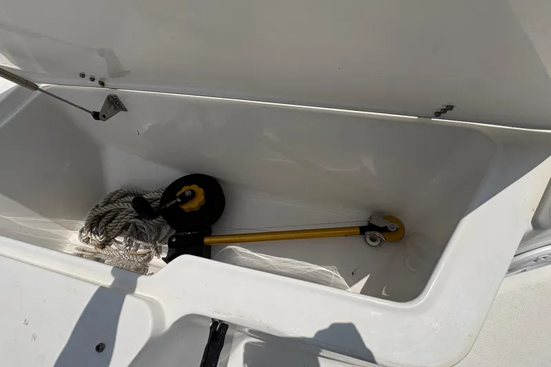 Slide: The Image of 2013 Seahunt Triton 225 boat with Yamaha outboard motor at dockside. - 28
