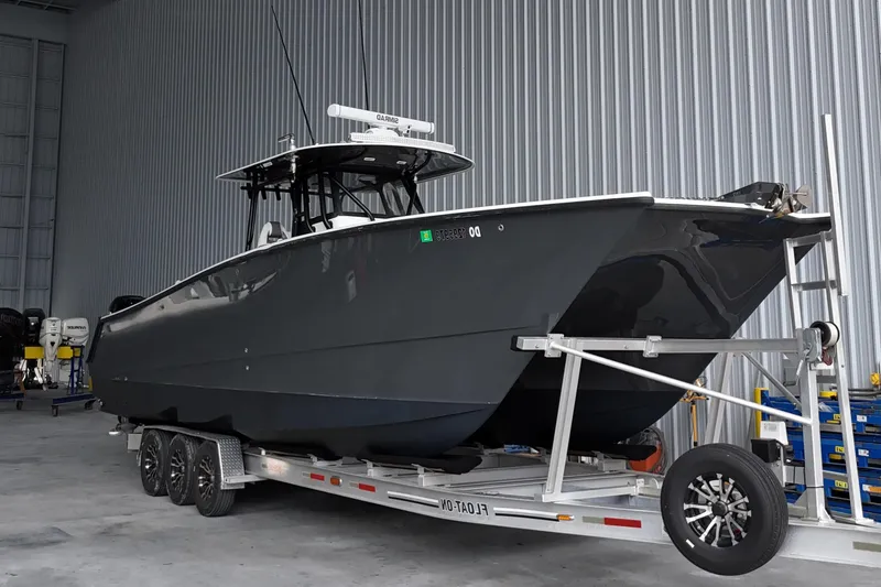 The Image of 2019 Freeman 34VH boat on trailer in storage facility. - 0