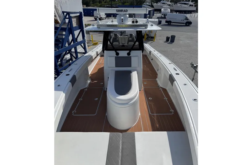 Slide: The Image of 2019 Freeman 34VH boat with sleek deck design and advanced navigation equipment. - 2
