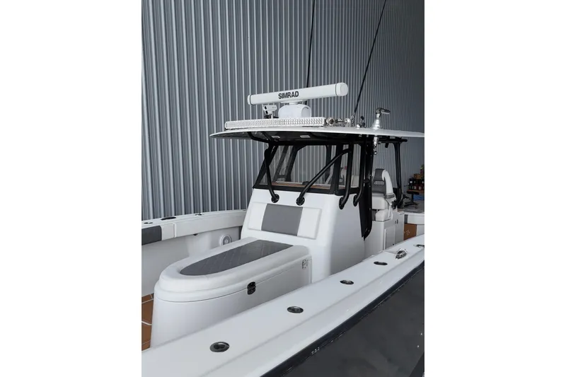 Slide: The Image of 2019 Freeman 34VH boat with sleek design and advanced navigation equipment. - 3