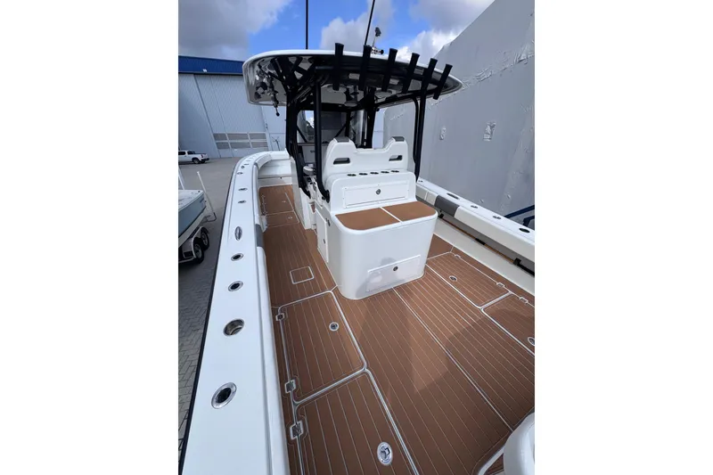 Slide: The Image of 2019 Freeman 34VH boat with sleek deck design and modern features. - 4